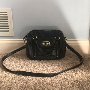 Black purse with shoulder strap
